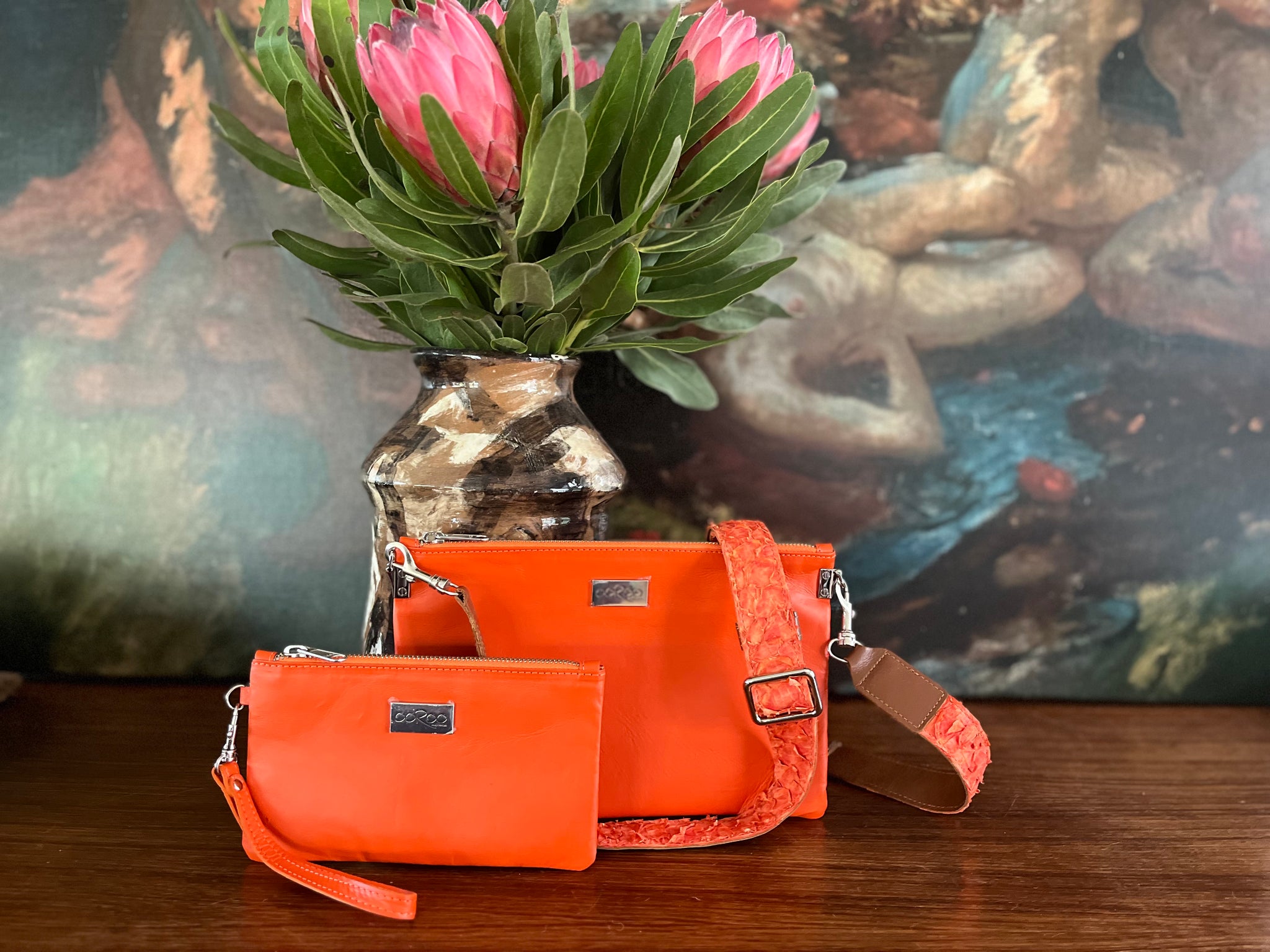 Zara cross body bag featuring  Orange Kangaroo leather