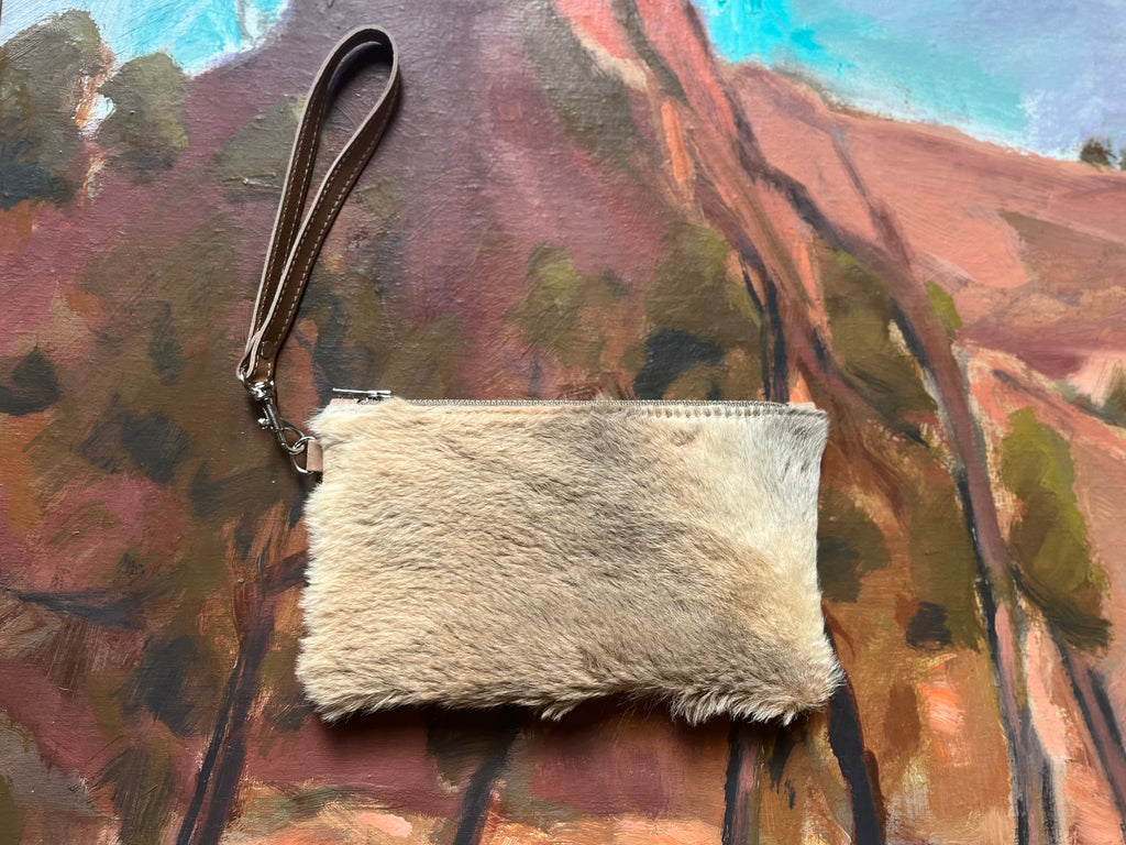 Ella purse featuring Kangaroo fur and kangaroo tan leather, wrist strap in bovine leather.