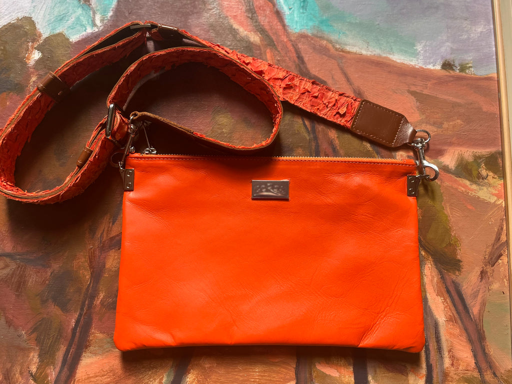 Zara cross body bag featuring  Orange Kangaroo leather