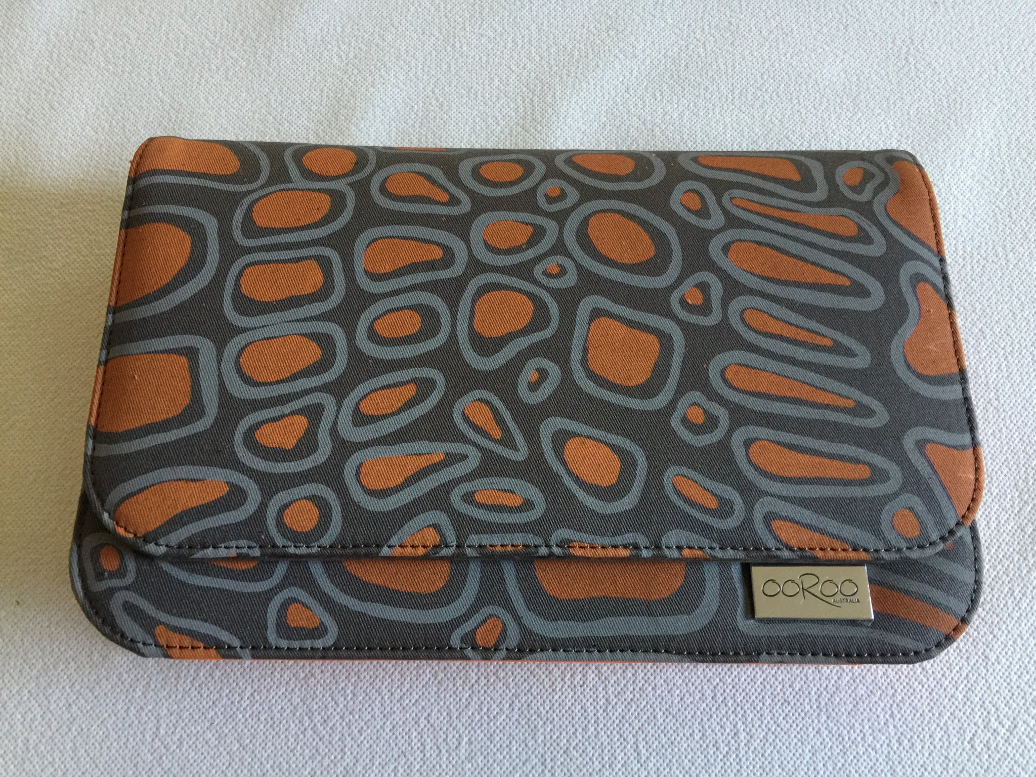 Meg Handbag/ small Clutch featuring Crocodile  by Aboriginal artist Aaron Mctaggart, Merrepen Arts