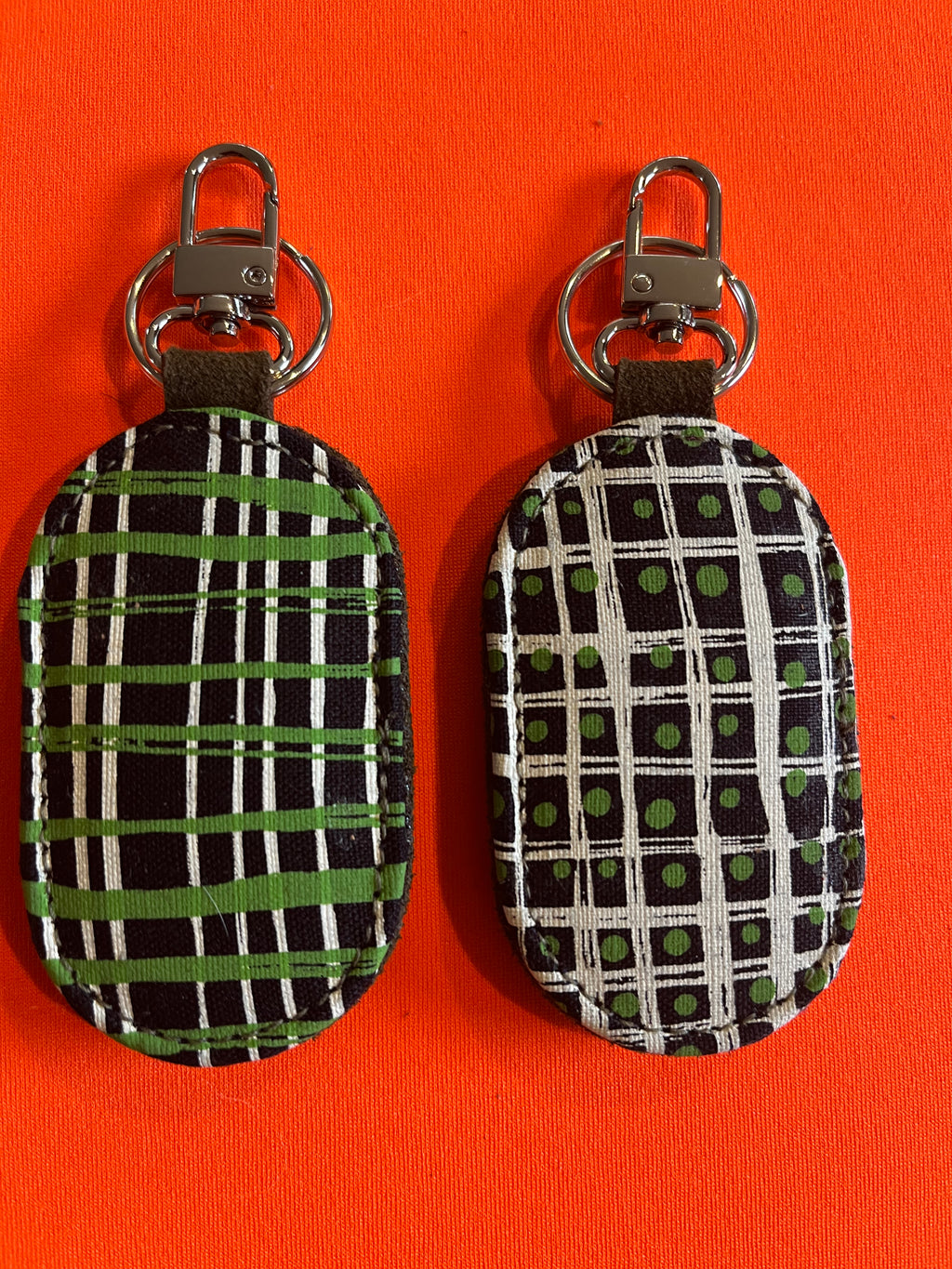 Key Fobs in various silk screen textiles from northern Australian Aboriginal artists