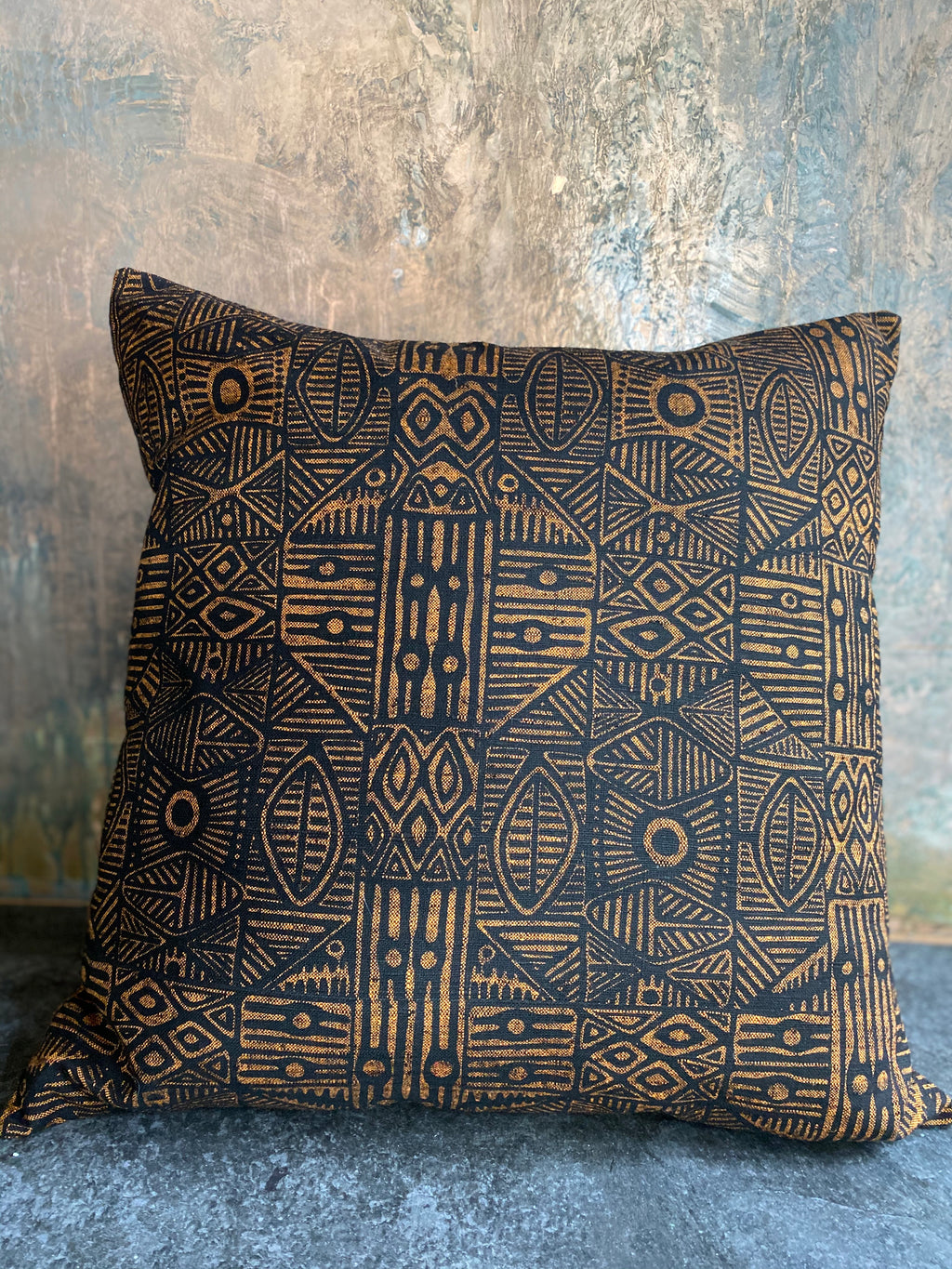Ooroo Australia cushion featuring Stone Axe  by artist Danny Mankara - c1978,Tiwi Designs