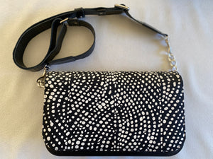 Meg handbag featuring Winga ( waves) by Aboriginal artist Maria Josette Orsto, Tiwi Designs