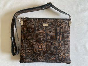 Fran crossbody handbag featuring Stone Axe in Raw silk  by Aboriginal artist Danny Munkara, Tiwi Designs