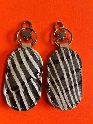 Key Fobs in various silk screen textiles from northern Australian Aboriginal artists